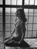 Actress Peggy Cummins Looking Out of a Window