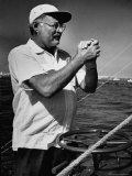 Author Ernest Hemingway at Wheel of Fishing Boat During Fishing Tournament