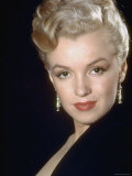 Actress Marilyn Monroe Wearing Dangling Rhinestone Earrings  with Her Hair Up