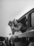 Child Actress Shirley Temple Taking Pictures of Famous Sites from Her Car