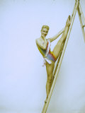 Prima Ballerina of Paris Opera Claude Bessy Lifting Her Leg Above Her Head on a Ladder