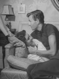 Actor Robert Walker Rehearsing Love Scene with Actress Wife Jennifer Jones on Sofa at Home