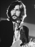 Rock Star Eric Clapton Playing Guitar in the Group Blind Faith