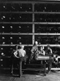 Torpedo Men Relaxing Beneath Rows of Deadly Torpedoes in Torpedo Shop During WWII