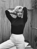 Actress Marilyn Monroe Playfully Elegant  at Home