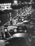 Night View of "Gilmore Serve Yourself Save 5 Cents Per Gallon Gas Station"