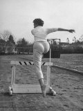 Dancer and Actress Sheree North Leaping over a Hurdle at Beverly Hills High School Track
