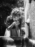 Actress Sophia Loren Drinking Water from Spigot