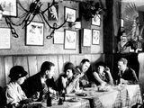 Patrons at a Prohibition Protected Speakeasy Popular for Drinking Aviators