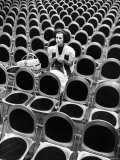 Singer Jane Froman Knitting in Empty Studio Audience Chairs During a Radio Broadcast Rehearsal