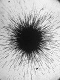 Radioactivity of Radium is Revealed by a Tiny Speck Showing the Tracks of Particles Emitted