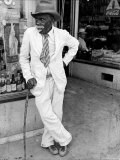 Old African American Man Wearing a Disheveled Outfit in Small Southern Town
