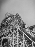 Thrill Seekers at the Top of the Cyclone Roller Coaster at Coney Island Amusement Park