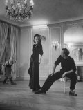 Jacques Fath Watching as His Wife Models an Evening Dress He Designed