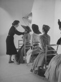 Vogue Magazine Editor Bettina Ballard Directing and prepping models for Photo Shoot at Studio