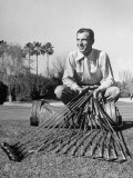 Golfer Ben Hogan with Golf Clubs