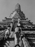 Ambassador John E Peurifoy and His Wife Climbing the Temple of the Dawn