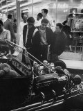 Enthusiasts Admiring Chromed Roadster Ford with a Cadillac Engine That Took 5 Years to Build