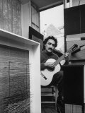 Venezuelan Kinetic Artist Raphael Jesus Soto  Playing Guitar in His Apartment