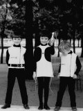 Three Little Kids in the Park While Modeling Their Black and While Pierre Cardin Outfits