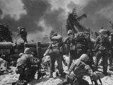 US Marines Climbing to Attack Japanese Positions During Battle to Take Tarawa Atoll