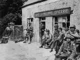 American Soldiers Resting Outside Small French Grocery Store/Cafe