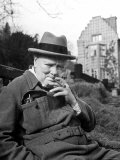 Former Pm Winston Churchill Resting on Bench  Puffing on Cigar  Outside Country Estate Chartwell
