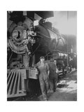 Women Rail Workers Standing at Work on Engine of Train  During WWI at Great Northern Railway