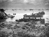 Coast Guard Manned Navy Landing Craft Disgorging Equipment and Supplies Occupying Japanese Forces