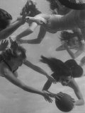 Girl Getting Her Hair Pulled as Swimmers Play a Fast Scrimmage of Water Polo at Athletic Club