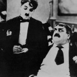 Charlie Chaplin with Eric Campbell in The Rink