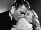 Gregory Peck Embracing Ann Todd in Publicity Still for Alfred Hitchcock's Film "The Paradine Case"