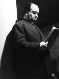 Movie Director Alfred Hitchcock Dourly Reading Script for the Movie 