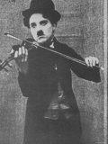 Charlie Chaplin as a Street Musician in The Vagabond