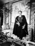 Poet and Filmmaker Jean Cocteau Dressed in Uniform of Academie Francaise  Holding Sword He Designed