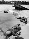 Bodies of American Soldiers Lying in Sand on Shoreline on Buna Beach After a Japanese Ambush Attack
