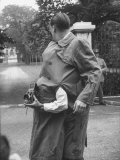 Wearing Coat with Second Man Buttoned Inside  Giving Weird Effect of Two Armed Man Holding Camera