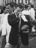 Football Coach Jack Freeman Holding Ball Weeps with Joy After His Team
