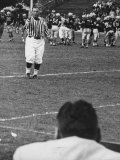 Referee  Dave Kaufman  going to Navy Sidelines to tell there is 4 minutes Remaining in 4th Quarter