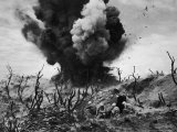 US Marines Crouching Behind Hillside Rock Cover  Blowing Up Cave Connected to Japanese Blockhouse