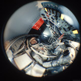 Fisheye View of Project Mercury Astronaut John Glenn in Mock Space Capsule  Location Unknown