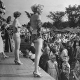 Women on Platform in Front of Tent to Stir Up Business for "Peep Show" at Michigan State Fair