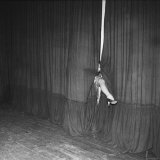 Actress Marlene Dietrich Seductively Protruding Out infamous leg Between Closed Stage Curtains
