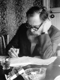 Poet John Barryman Writing at His Desk