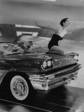 Model Jean Littleton in Swimsuit  Posing as Hood Ornament on the Front of a New de Soto Convertible