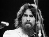 George Harrison Performing at a Rock Concert Benefiting Bangladesh  aka Kampuchea