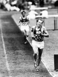 Distance Champion Emil Zatopek as He Set a New 10 000 Meter Record During the Olympic Games