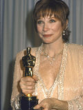 Shirley MacLaine Holding Her Oscar in Press Room at Academy Awards