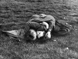 American Soldier and English Girlfriend Blissfully Embracing on Lawn in Hyde Park