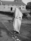 Dutch Child Hiding Flour Sack at United Nations Relief and Rehabilitation Administration Camp
